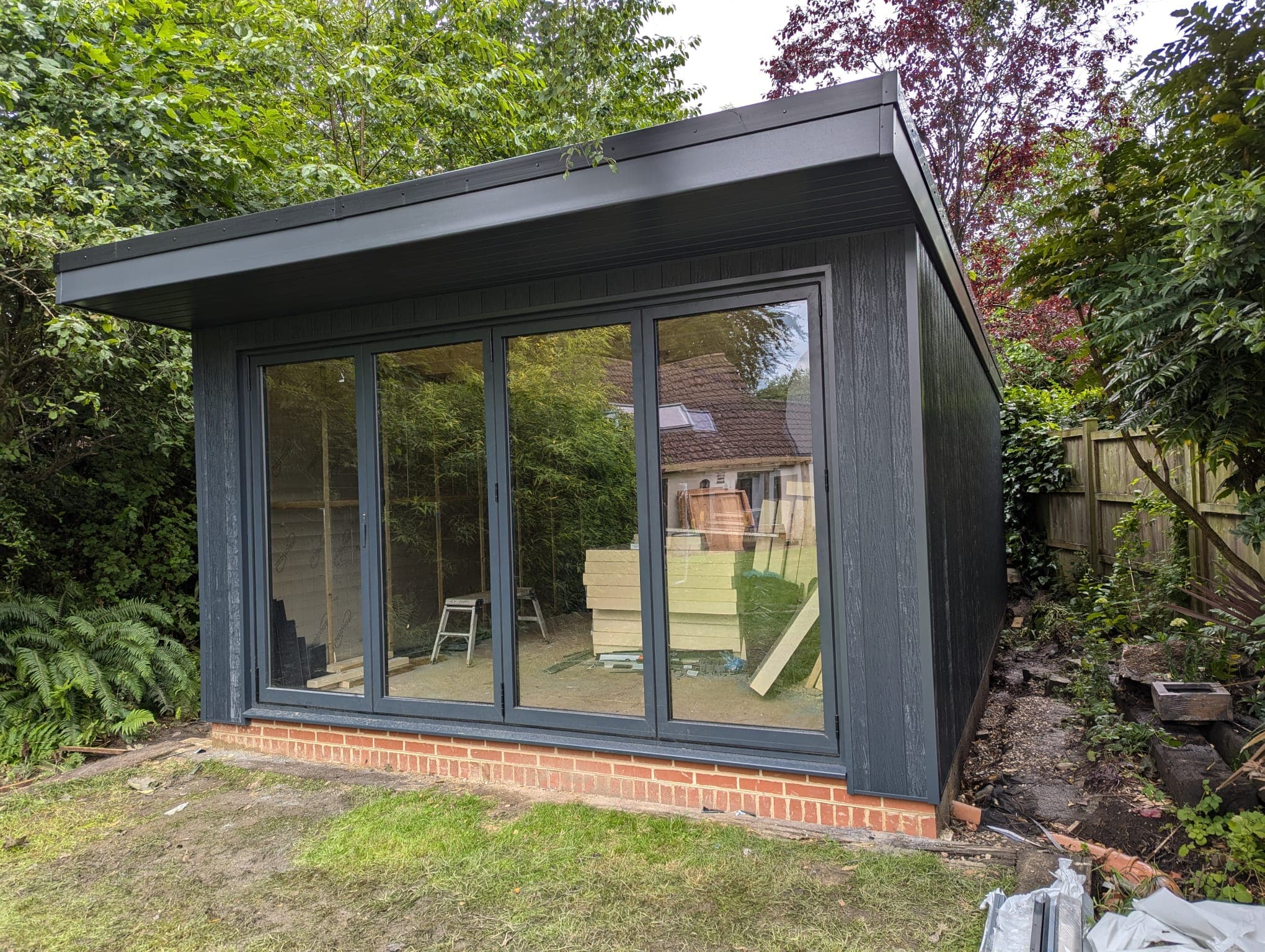 Garden building with bifold doors installed by Greenside Joinery