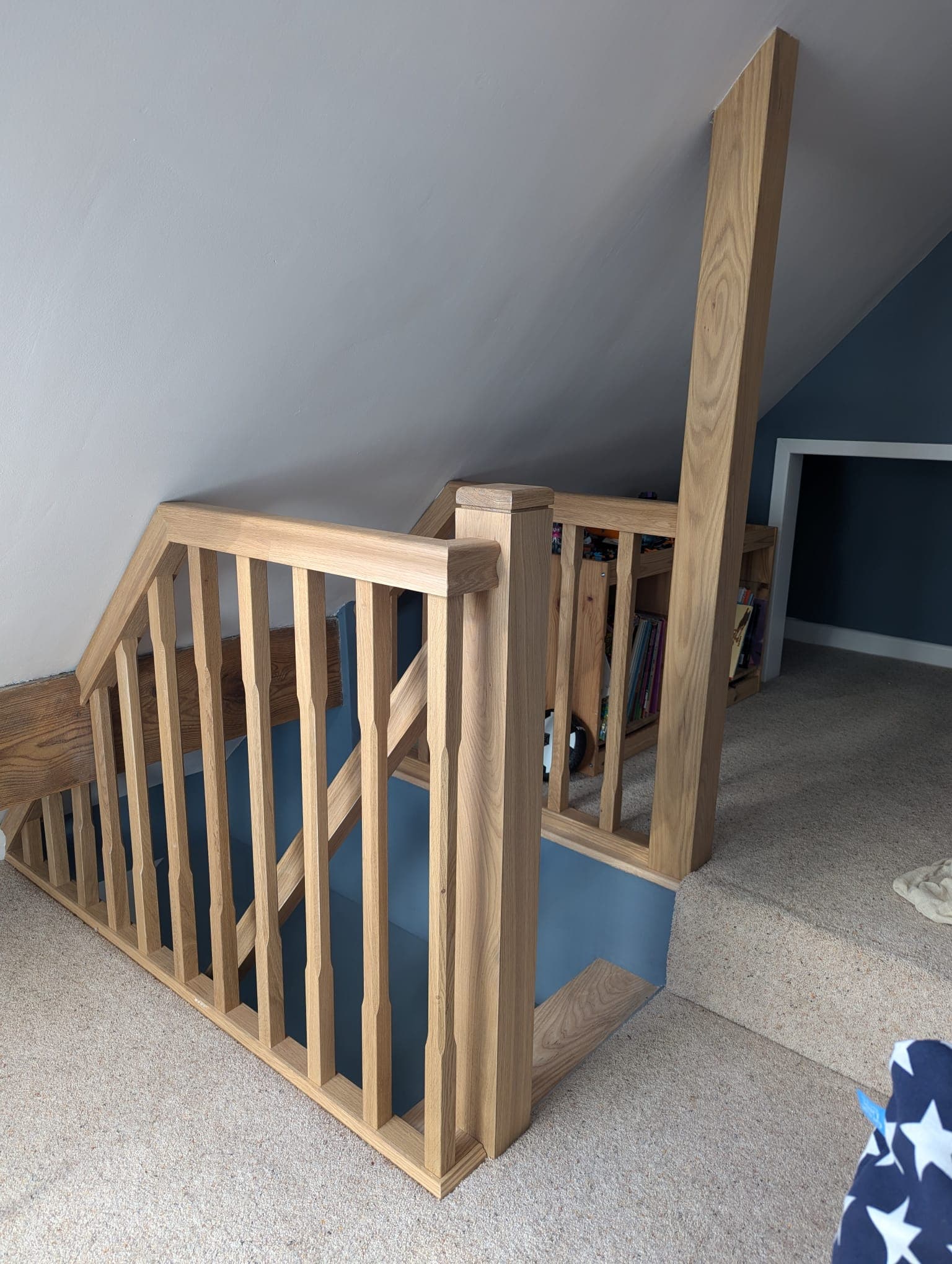 Oak balustrade fitted on a loft conversion by Greenside Joinery